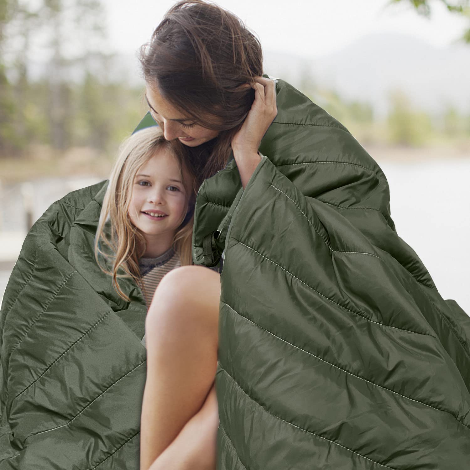 Gold Armour olive green blanket with corner loops staked for stable seating.