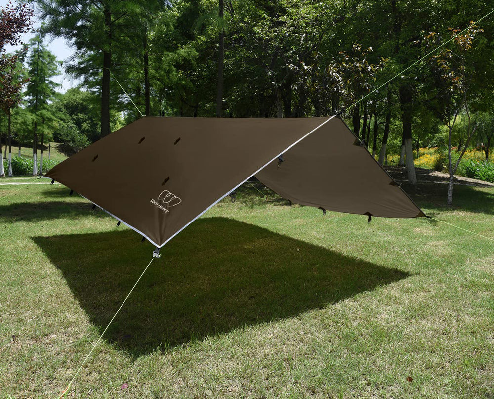 Gold Armour Rainfly Tarp Hammock packed in a backpack showcases ultralight, backpack-ready design.