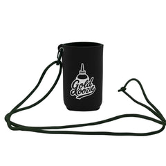 Gold Koozie neoprene sleeve protects snuffer bottle on creekside adventures.