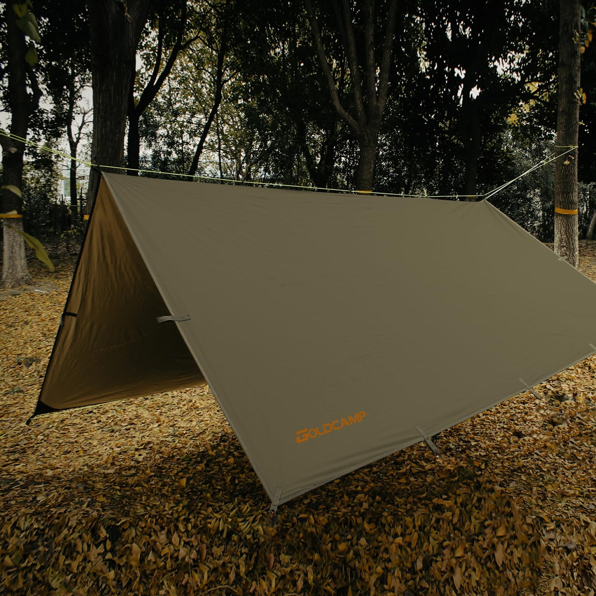 GoldCamp waterproof camping tarp setup demonstrates versatile shelter for rain protection and versatile camping needs.