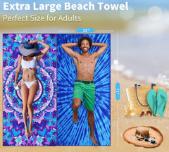 Gomust sand-free absorbent microfiber towel on beach surface