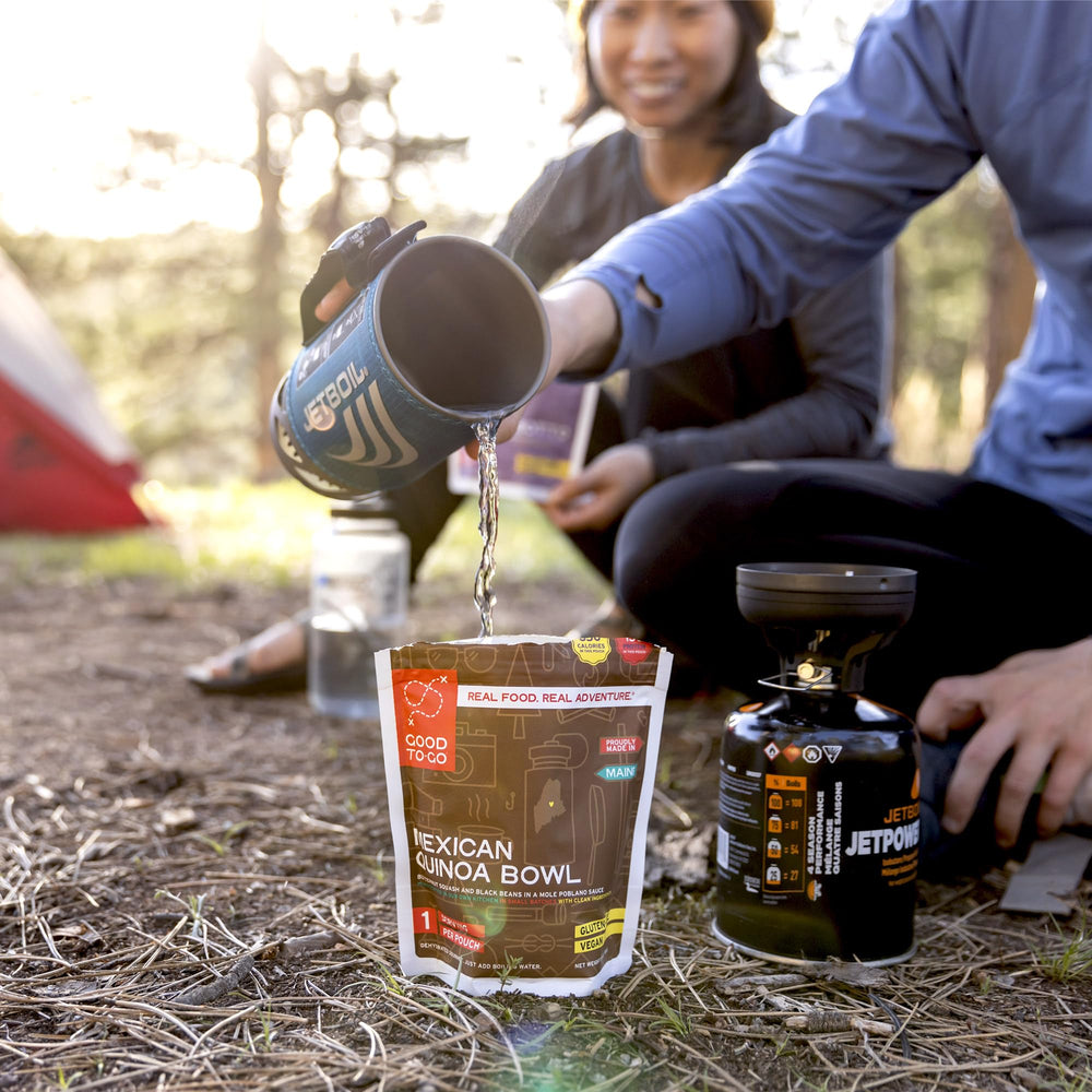 Backpacking scene featuring Good To-Go pouch, ready to rehydrate on demand.