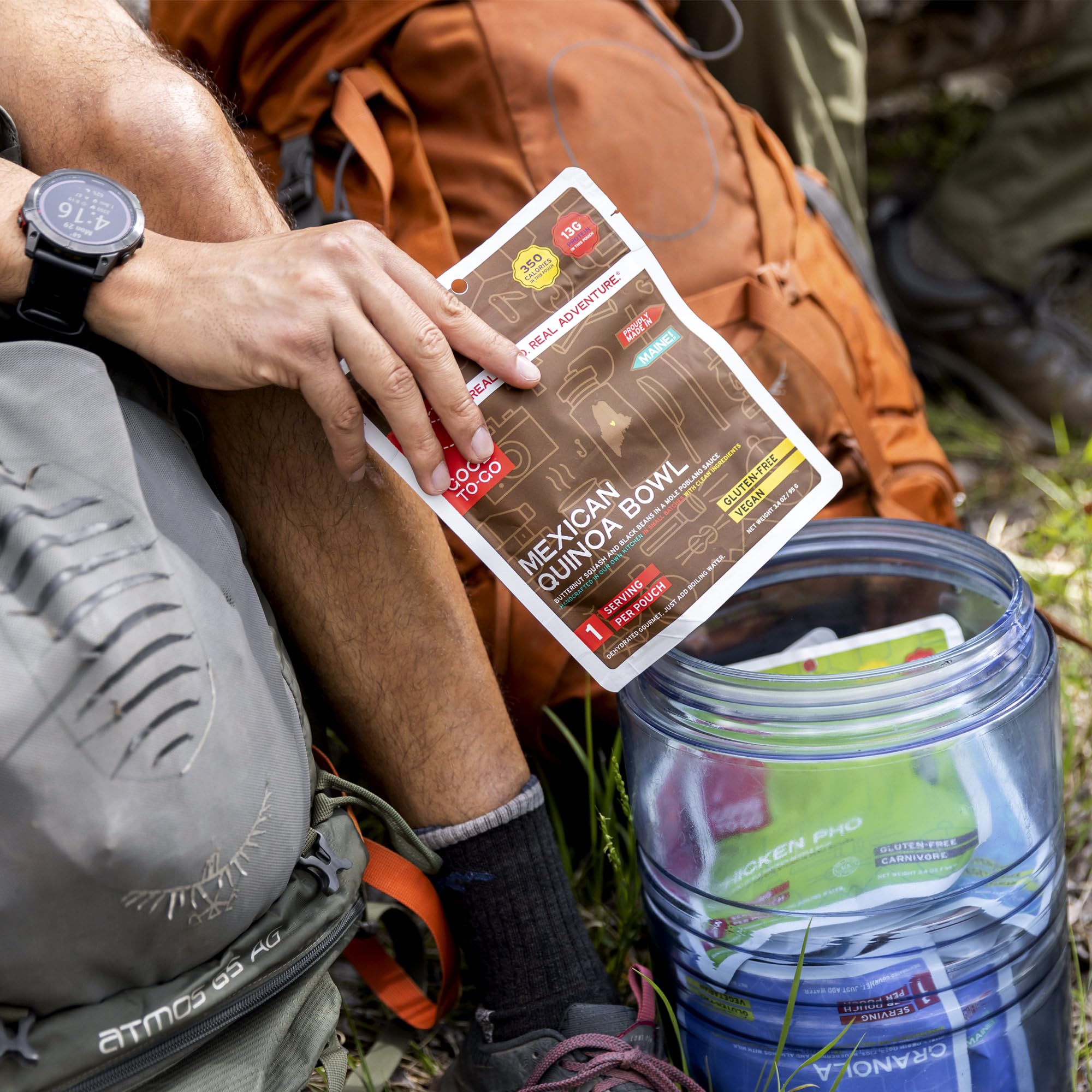 Camp stove setup with Good To-Go meal, perfect for quick trail lunches.