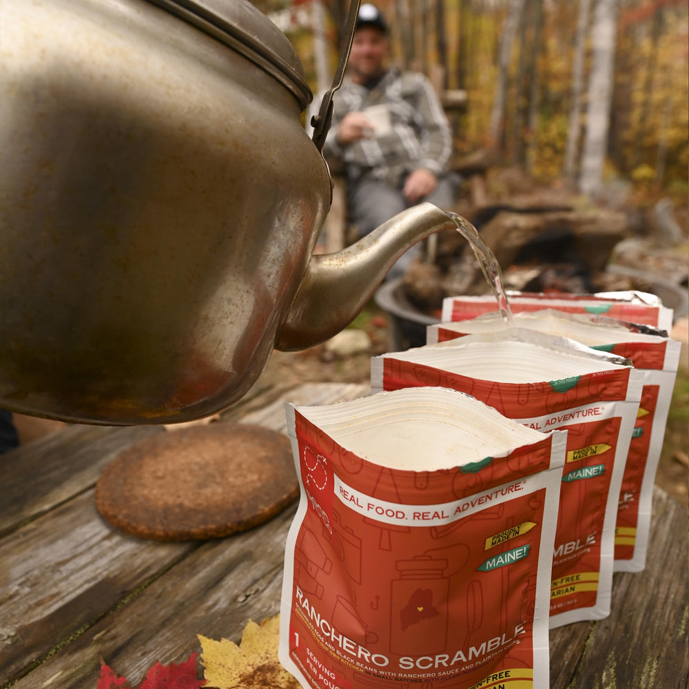 GOOD TO-GO Ranchero Scramble pouch at campsite setup for convenient meals.