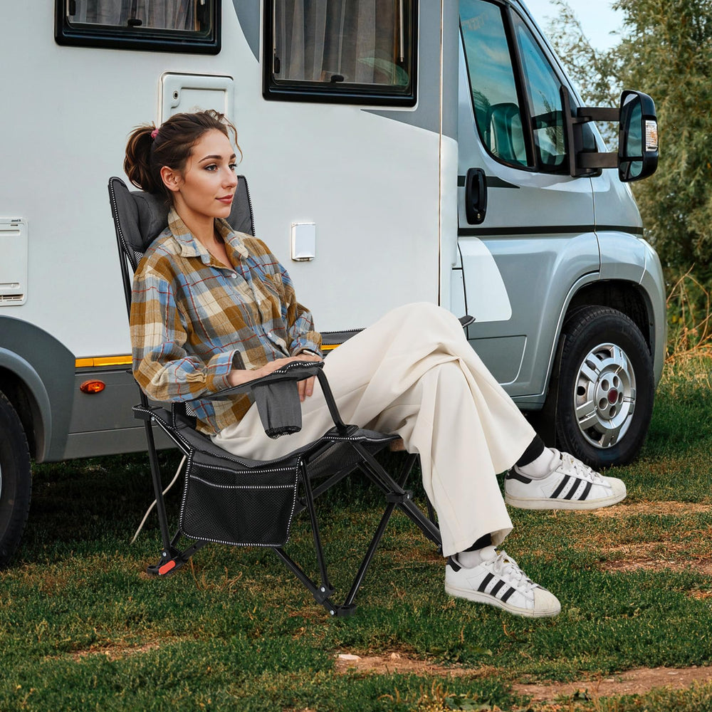 Goplus chair with detachable footrest for extended leg relaxation during camping