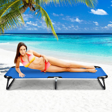 Goplus cot near water edge, suitable for beach or poolside use