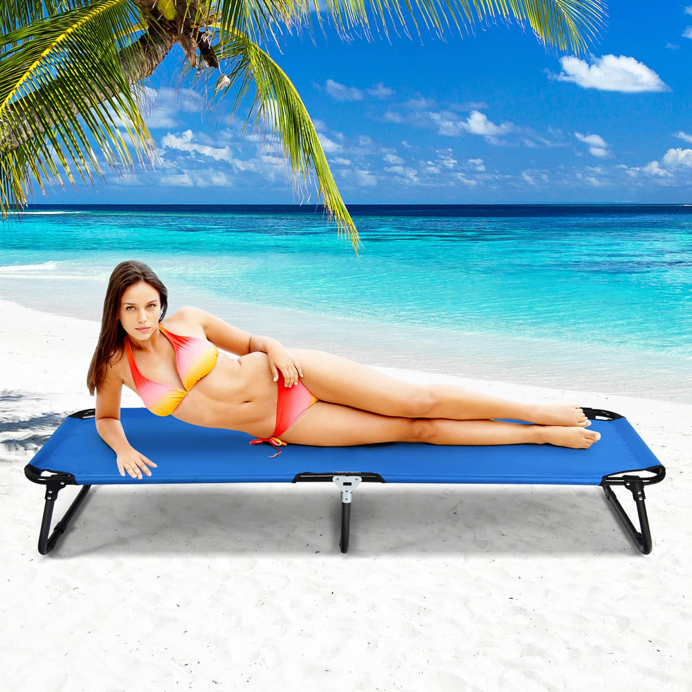 Goplus cot near water edge, suitable for beach or poolside use