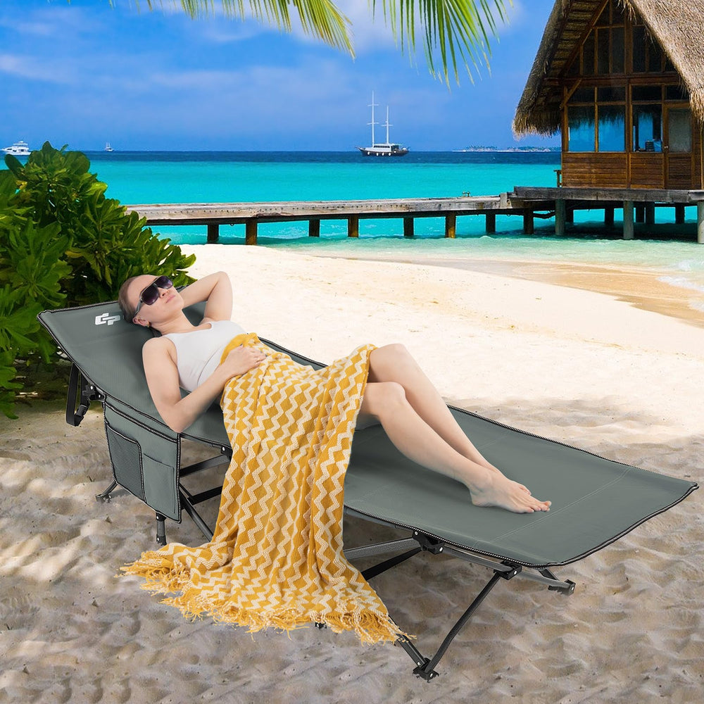 Goplus cot se replie rapidement pour rangement compact.