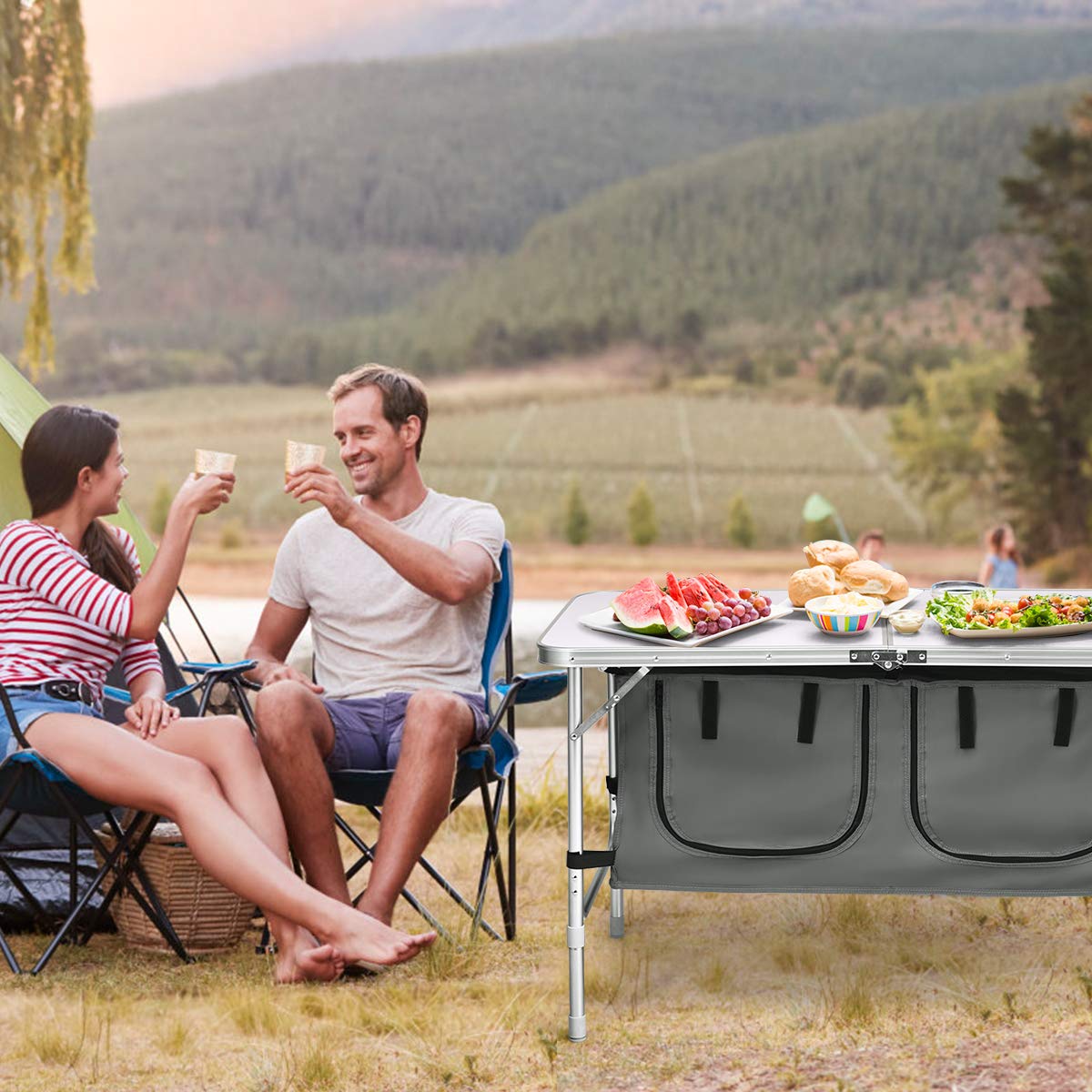 Goplus folding camping table compact fold, portable for car trunk storage.