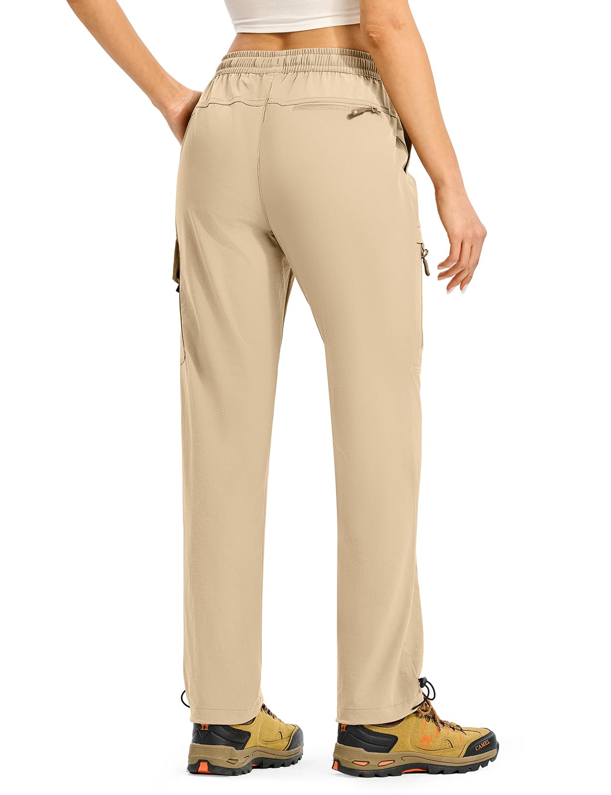 Gopune women's hiking pants in water-resistant quick-dry fabric during rain