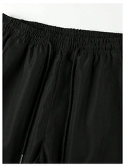 GORGLITTER boys cargo pants in black and blue showcase durable style for park and travel.