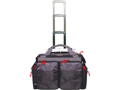 G.P.S. bag with oversized ATV wheels handles gravel parking lots smoothly.