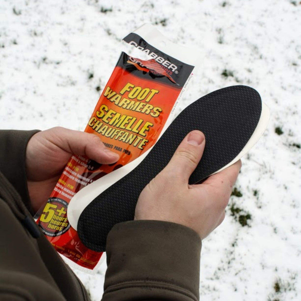 Grabber Insole Warmers placed inside a shoe for comfortable warmth all day