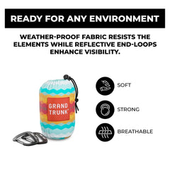 Grand Trunk TrunkTech Double Hammock in use outdoors, versatile for backyard or beach relaxation.