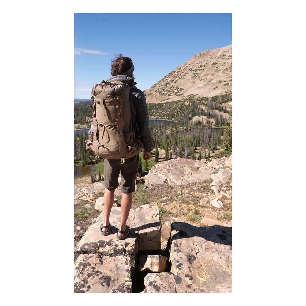 Granite Gear Blaze 60L hydration port enables water access on trail