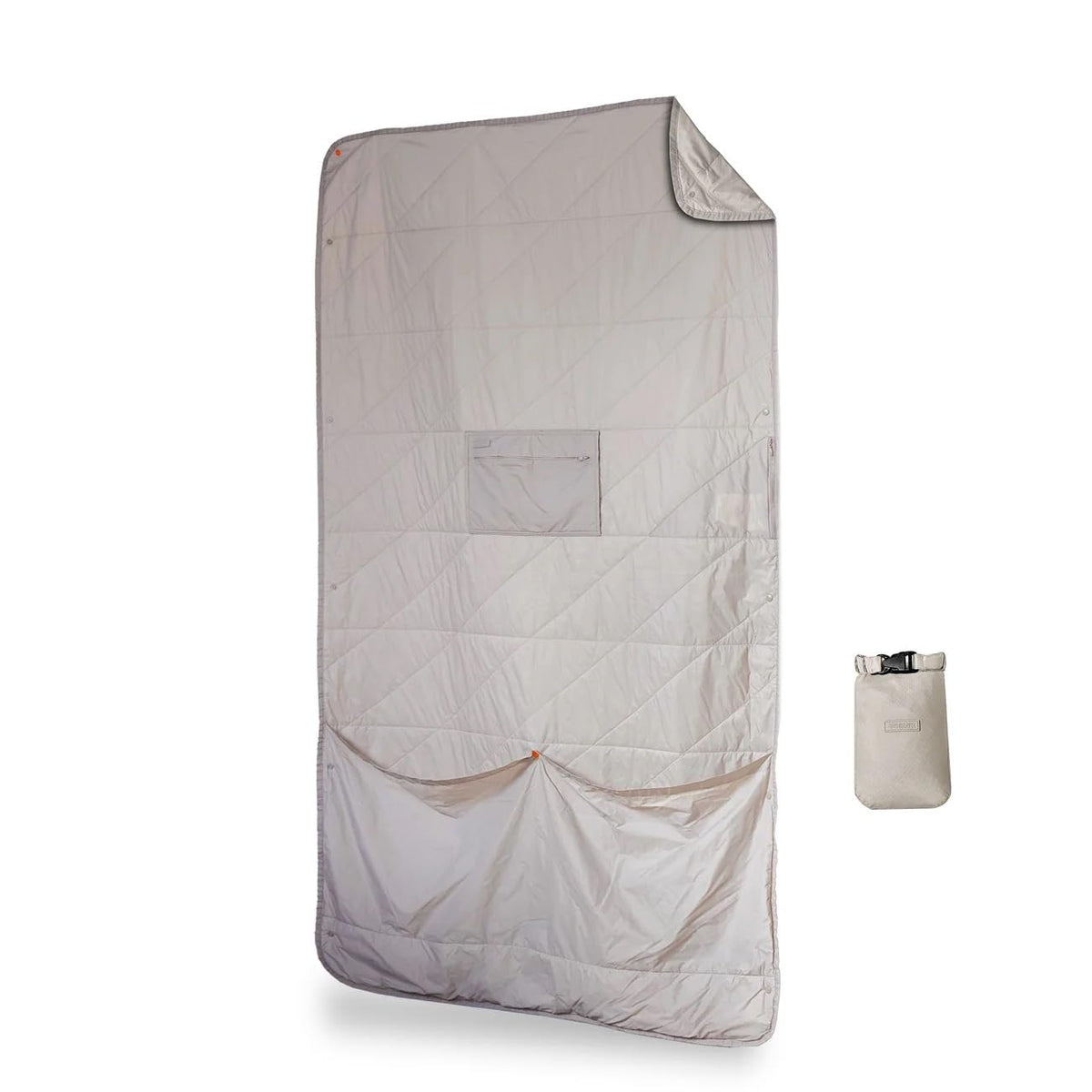 Gravel Layover blanket folded compact for ultra-portable travel warmth.