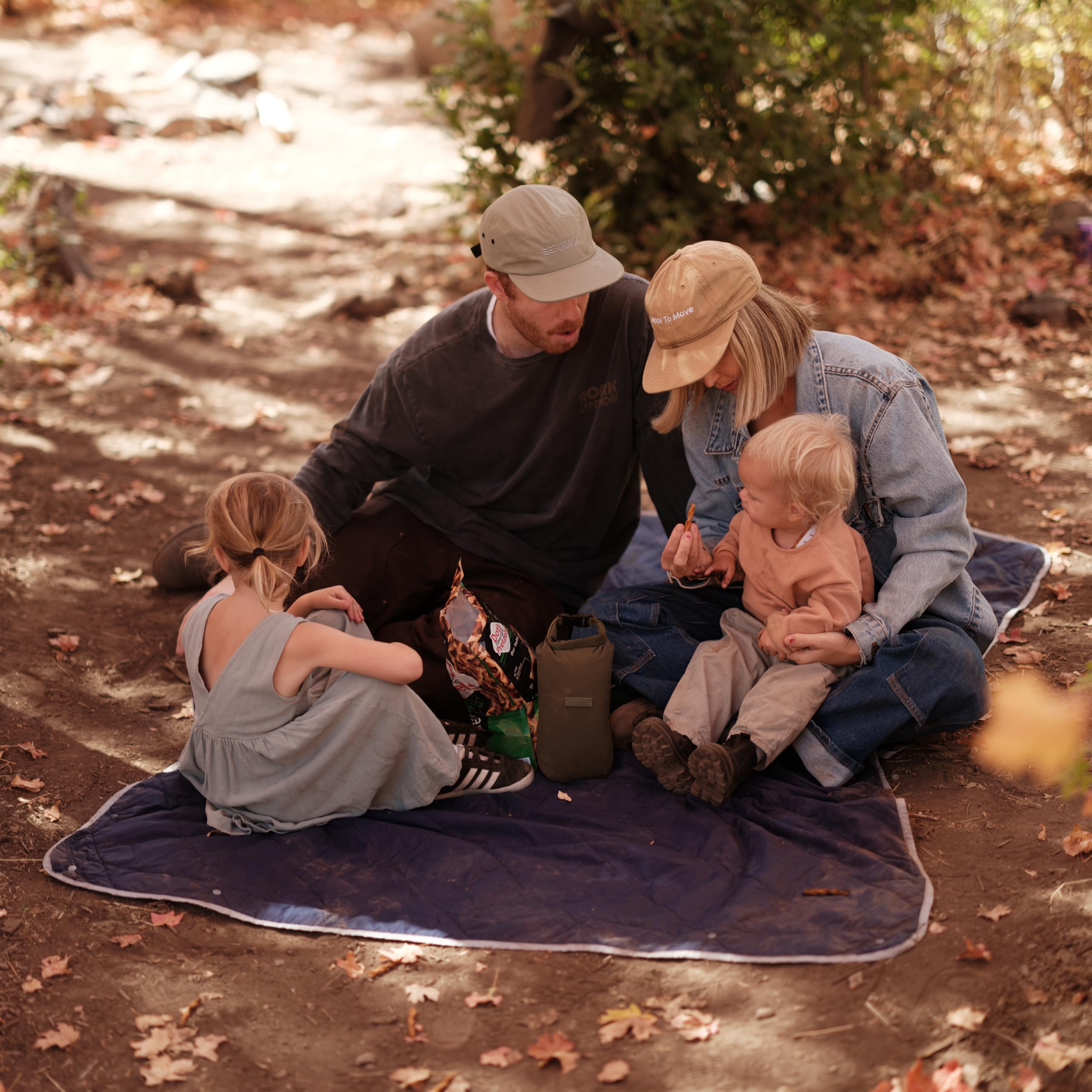 Gravel Layover blanket in carry-on shows easy packing and on-the-go comfort.