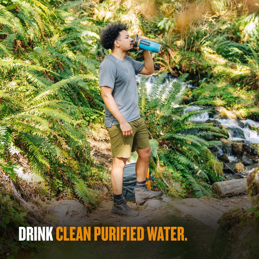 GRAYL GeoPress 24 oz Bali Blue in use during a hike conveys reliability in remote streams