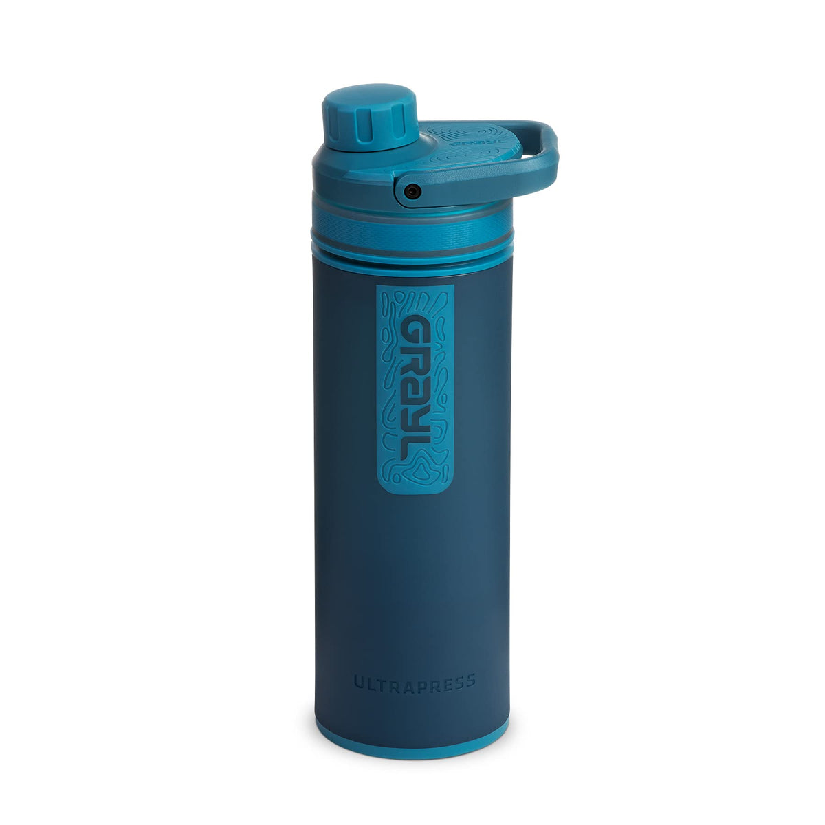 GRAYL UltraPress forest blue bottle filling from a river for safe hydration on the go.