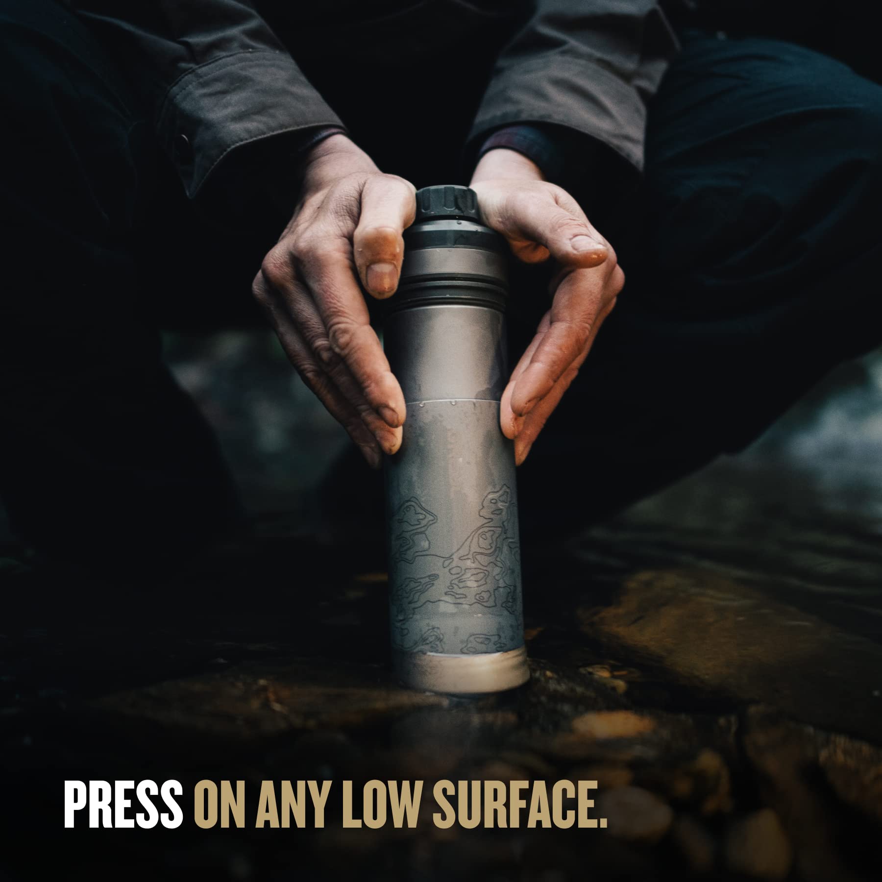 GRAYL UltraPress Titanium filter system close-up shows contaminant removal