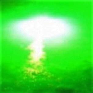 Green Blob Outdoors LED underwater light on a boat enhances night fishing near the hull.