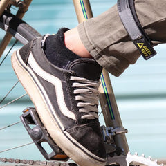 Green Guru ankle strap with reflective strip enhances night visibility on rides.