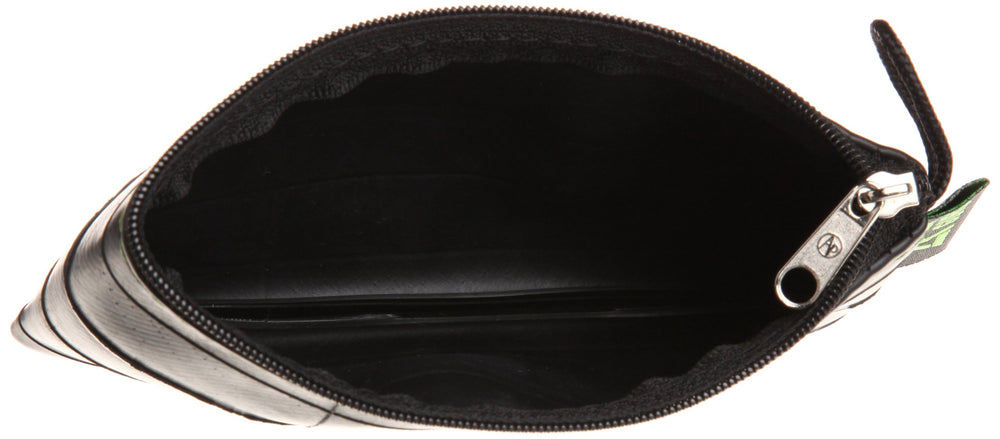 Green Guru Gear pouch in a travel setup, keeping essentials tidy.