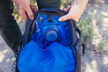 Main access zipper with molded ring pulls on Kiro 24L.