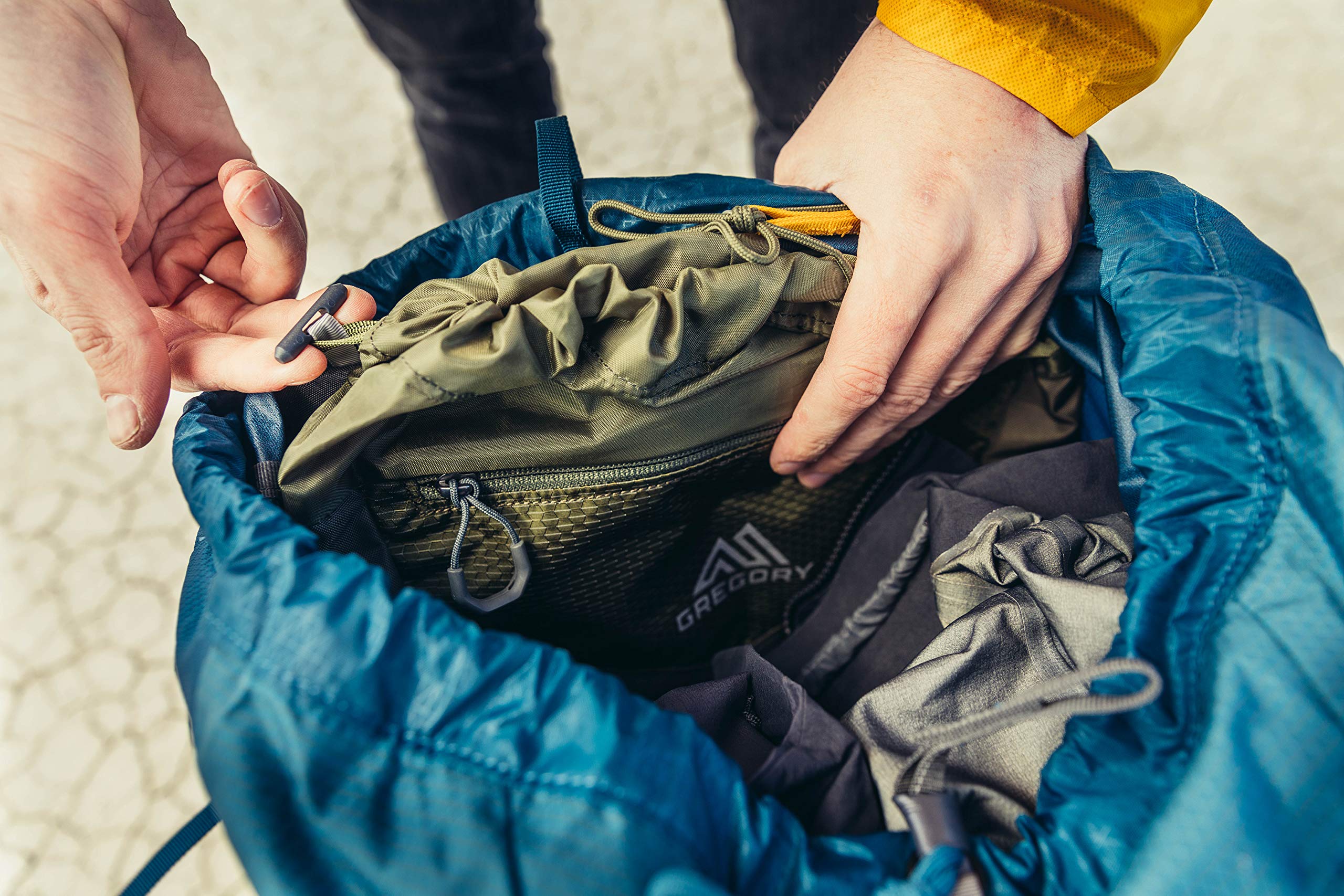 Gregory Maven 65L raincover pocket keeps gear protected in sudden showers