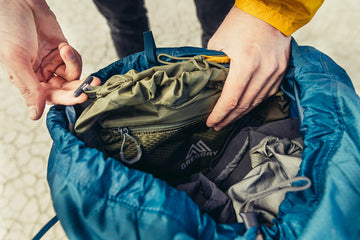 Gregory Maven 65L raincover pocket keeps gear protected in sudden showers