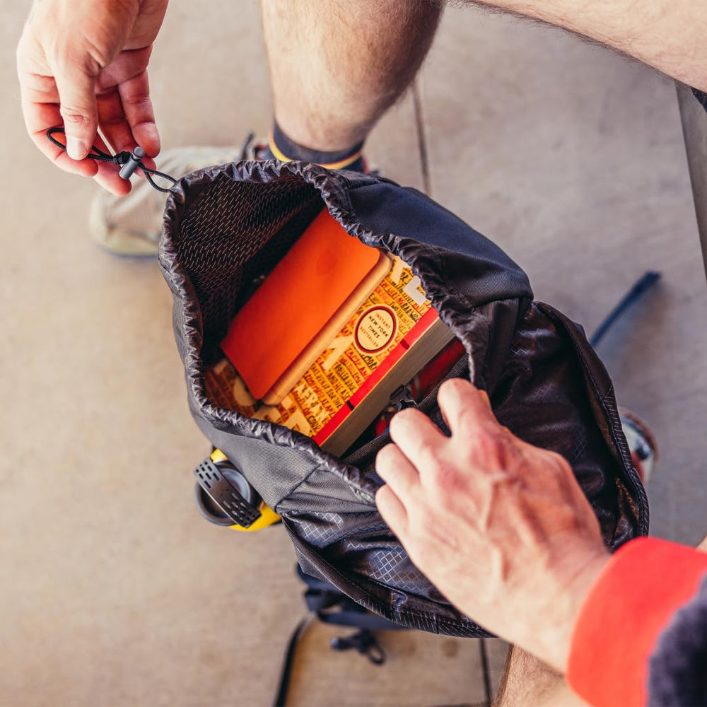 Gregory Nano 16L side stretch pocket ideal for water bottles.