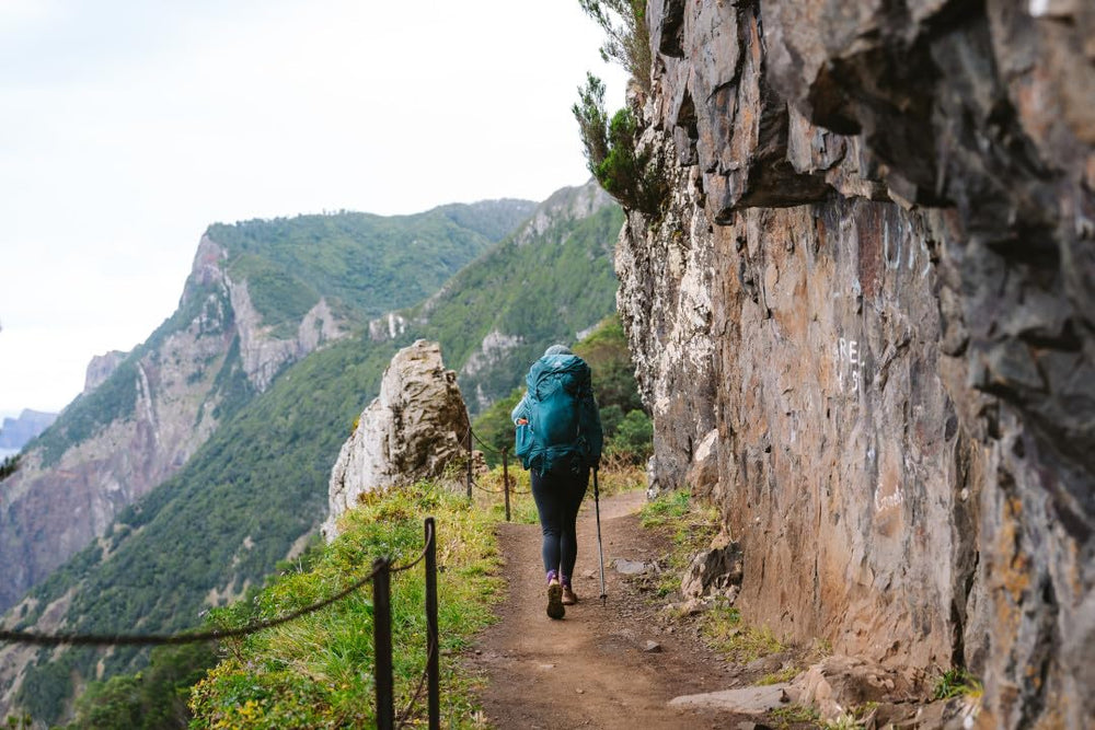 Gregory Paragon 50 floating top pocket demonstrates secure, easy-access storage on trail