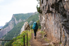 Gregory Paragon 50 floating top pocket demonstrates secure, easy-access storage on trail