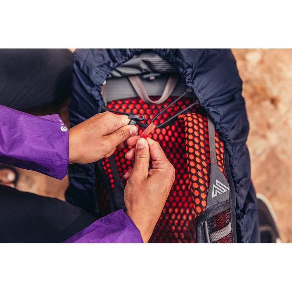 Gregory raincover with elastic drawcord and hipbelt loops for secure pack fit.
