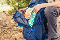 Gregory Zulu 65L side view illustrating balanced load on rough trails.