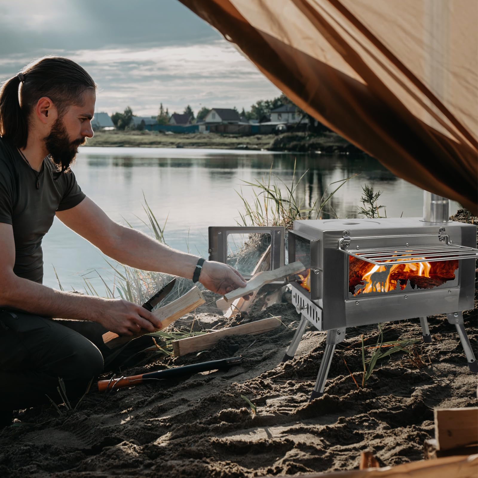 Greyhoo outdoor wood stove side view highlighting the glass window and warm camp atmosphere.