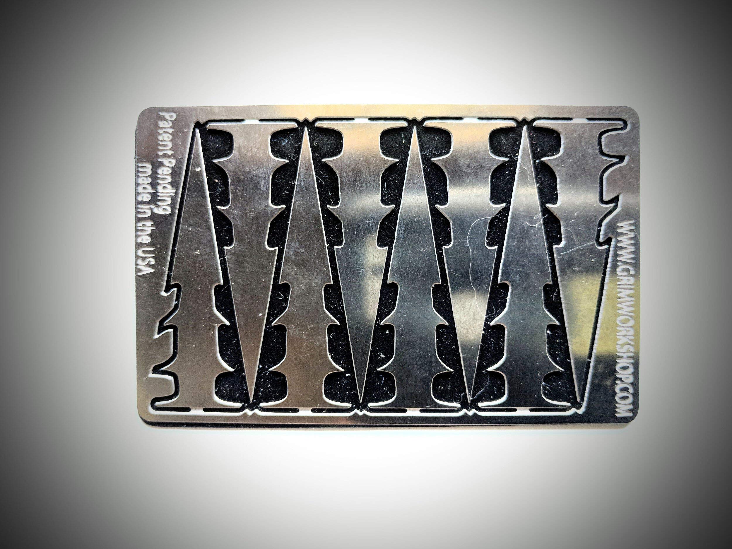 Grim Workshop Arrow Head Card showing semi-permanent adhesion for reusable placement