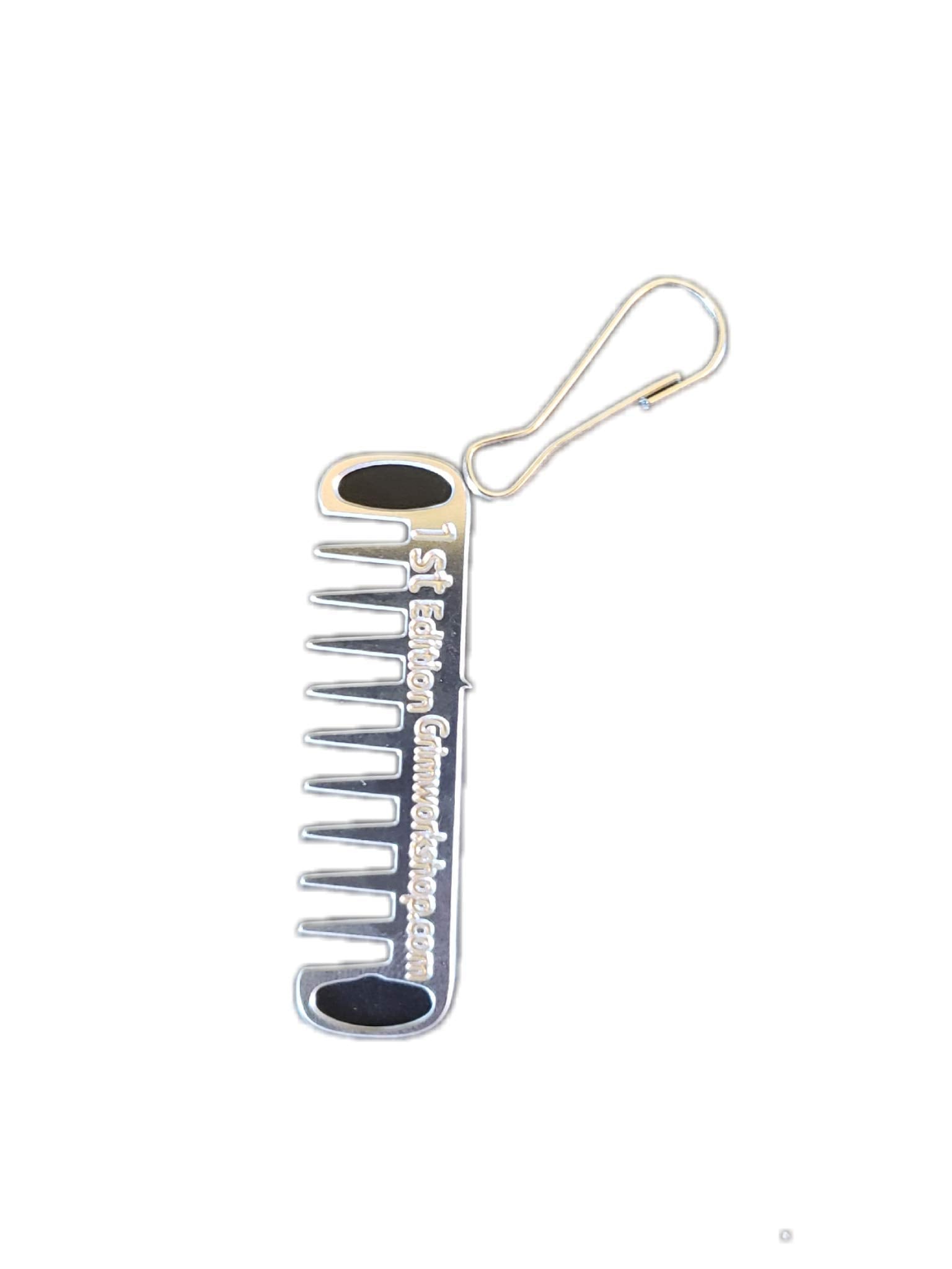 Grim Workshop Comb Micro Tool mounted on a backpack zipper for on-demand grooming.
