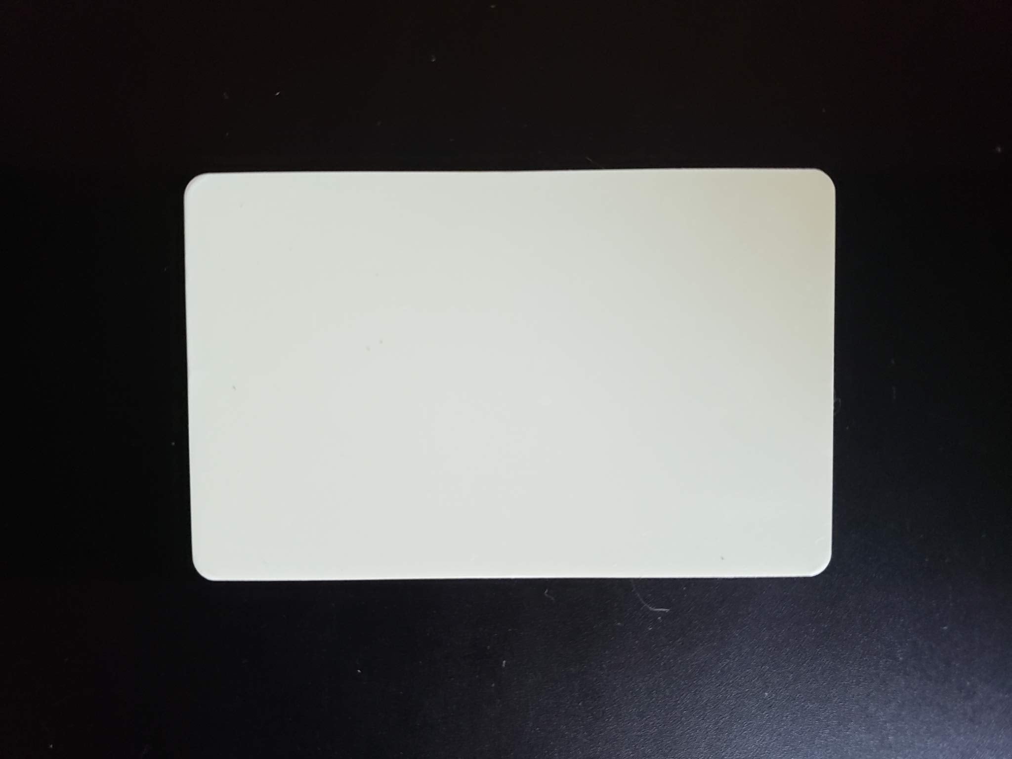 Grim Workshop glow card ultra-thin profile at 1mm thickness.