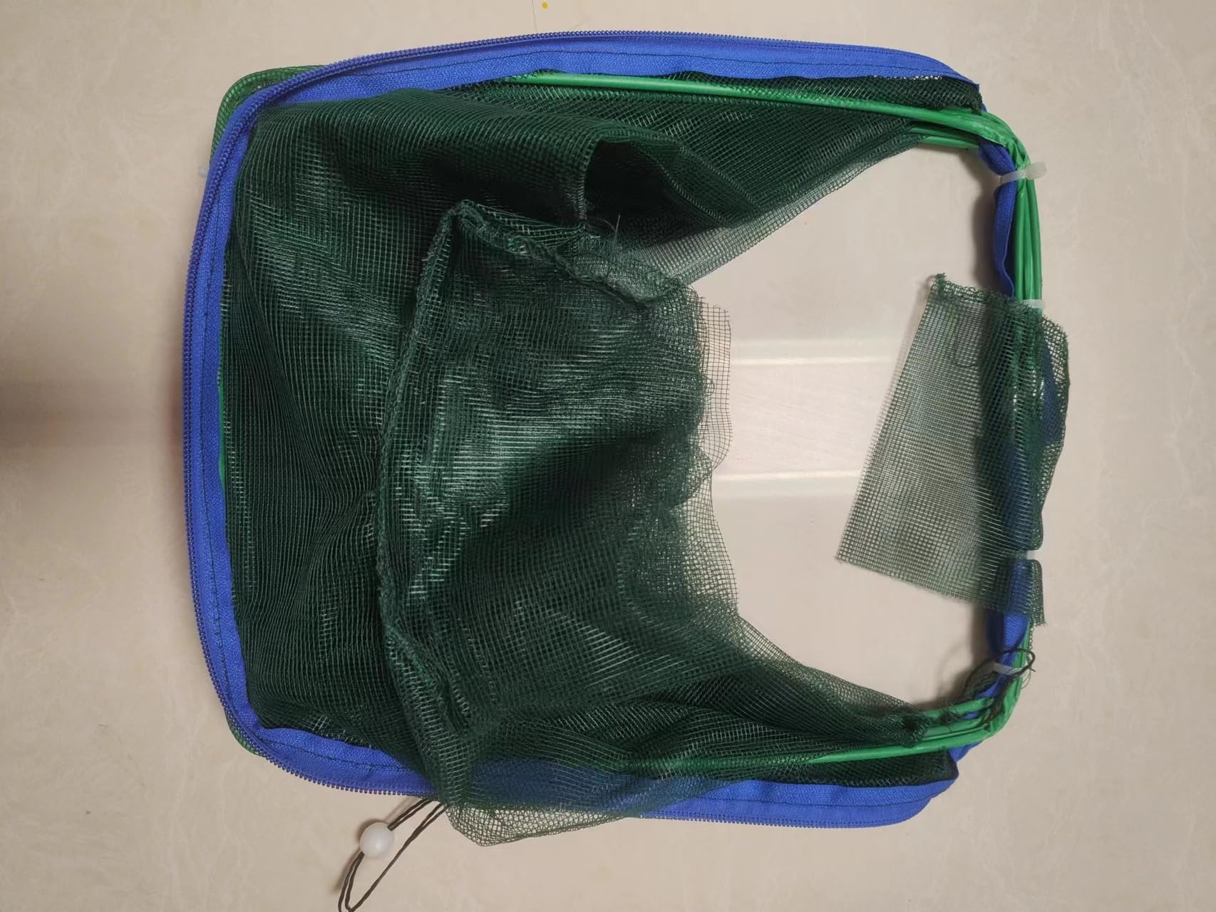 Trap in use in river for crabs, fish and shrimp