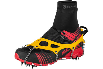 Grivel Explorer Light crampon side view with stable traction on snow and ice.