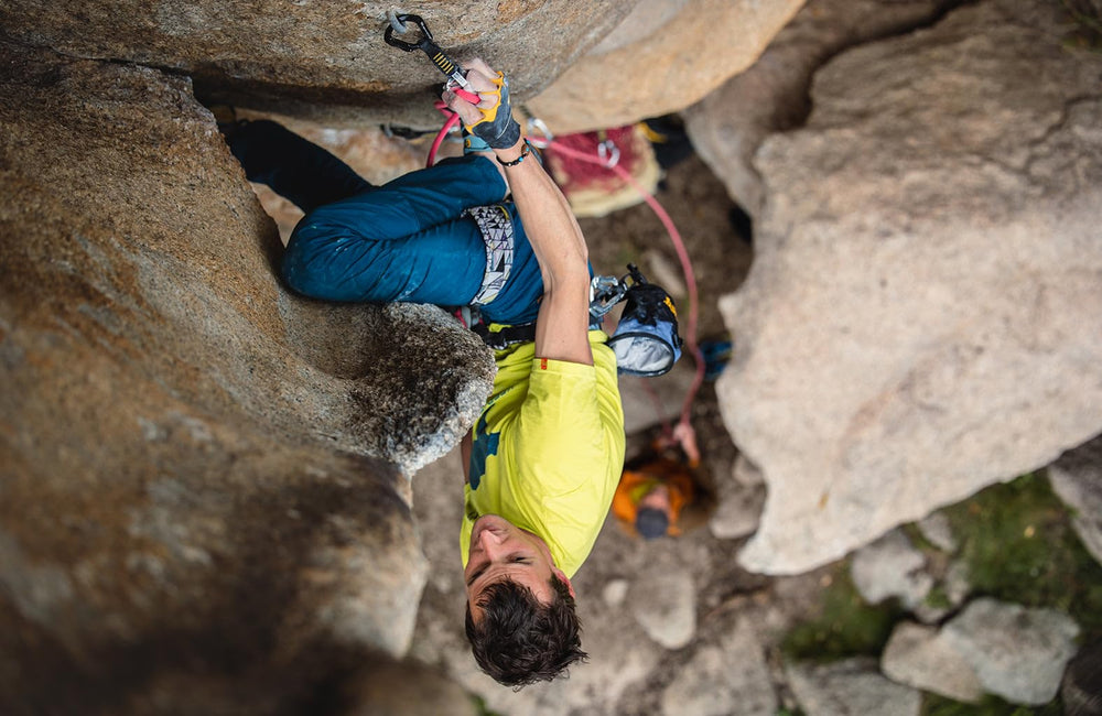 Grivel Stealth Quickdraw attached to a sport climbing bolt on a wall.