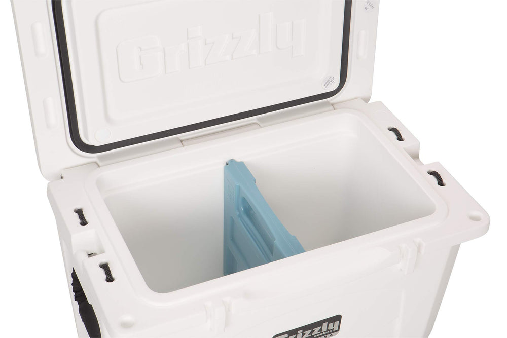 Grizzly IceDivider inside cooler groove keeps contents organized and separated.