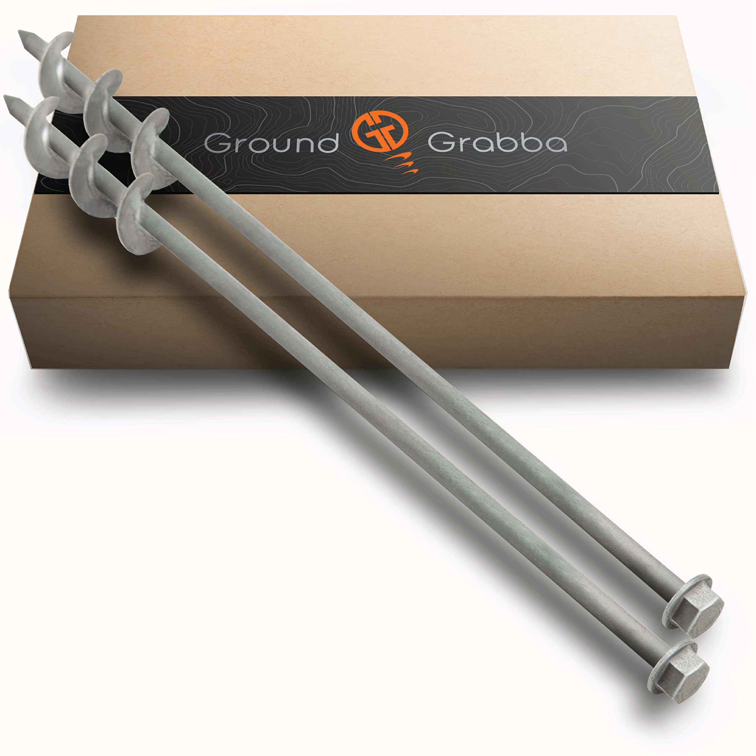 GroundGrabba screw-in tent stake in sandy ground for secure anchoring.