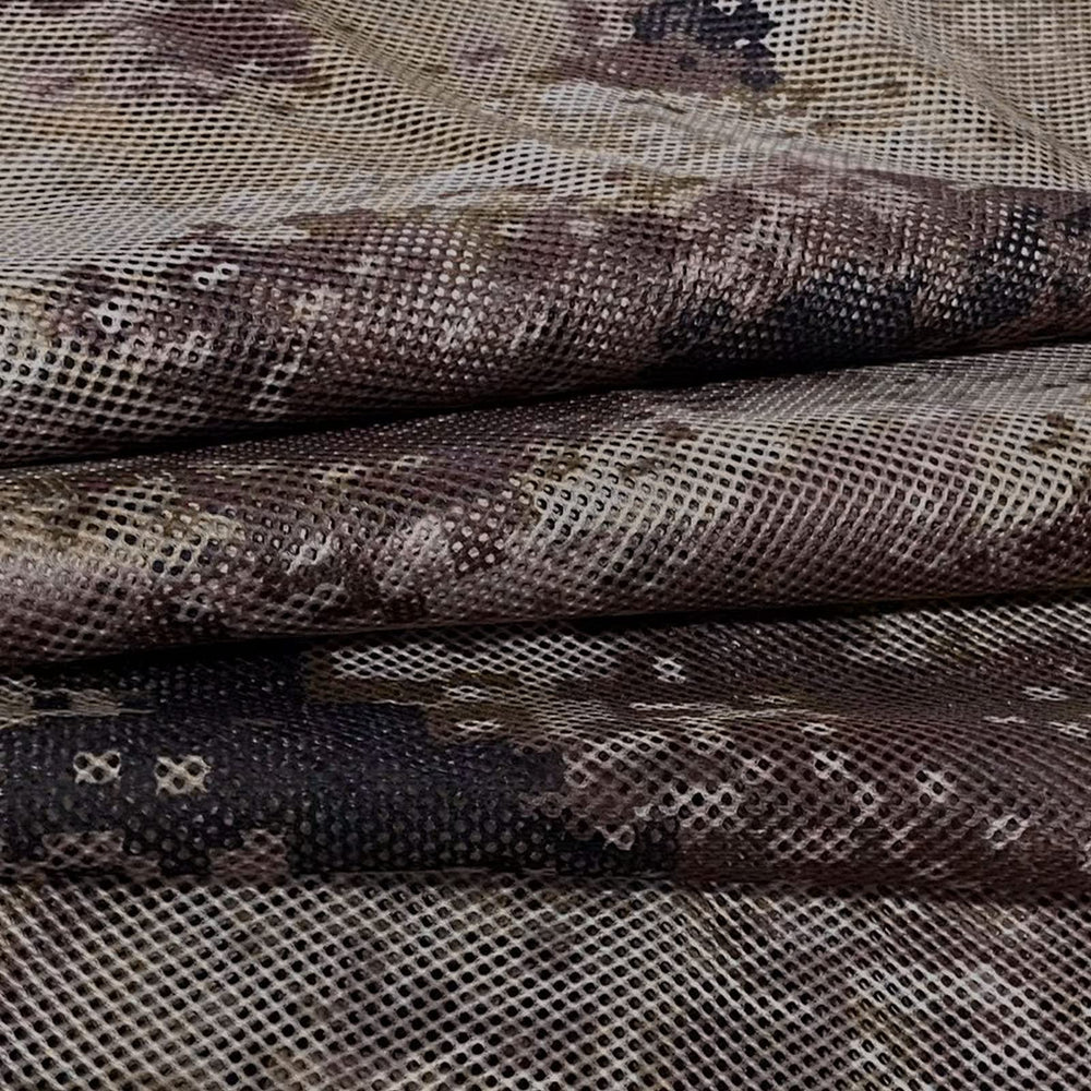 GRVCN camo burlap blind in forest setting demonstrates glare-free concealment for stealthy hunting.