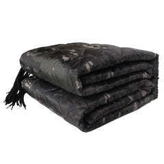 GRVCN military blanket with camo pattern provides versatile outdoor warmth for camping.