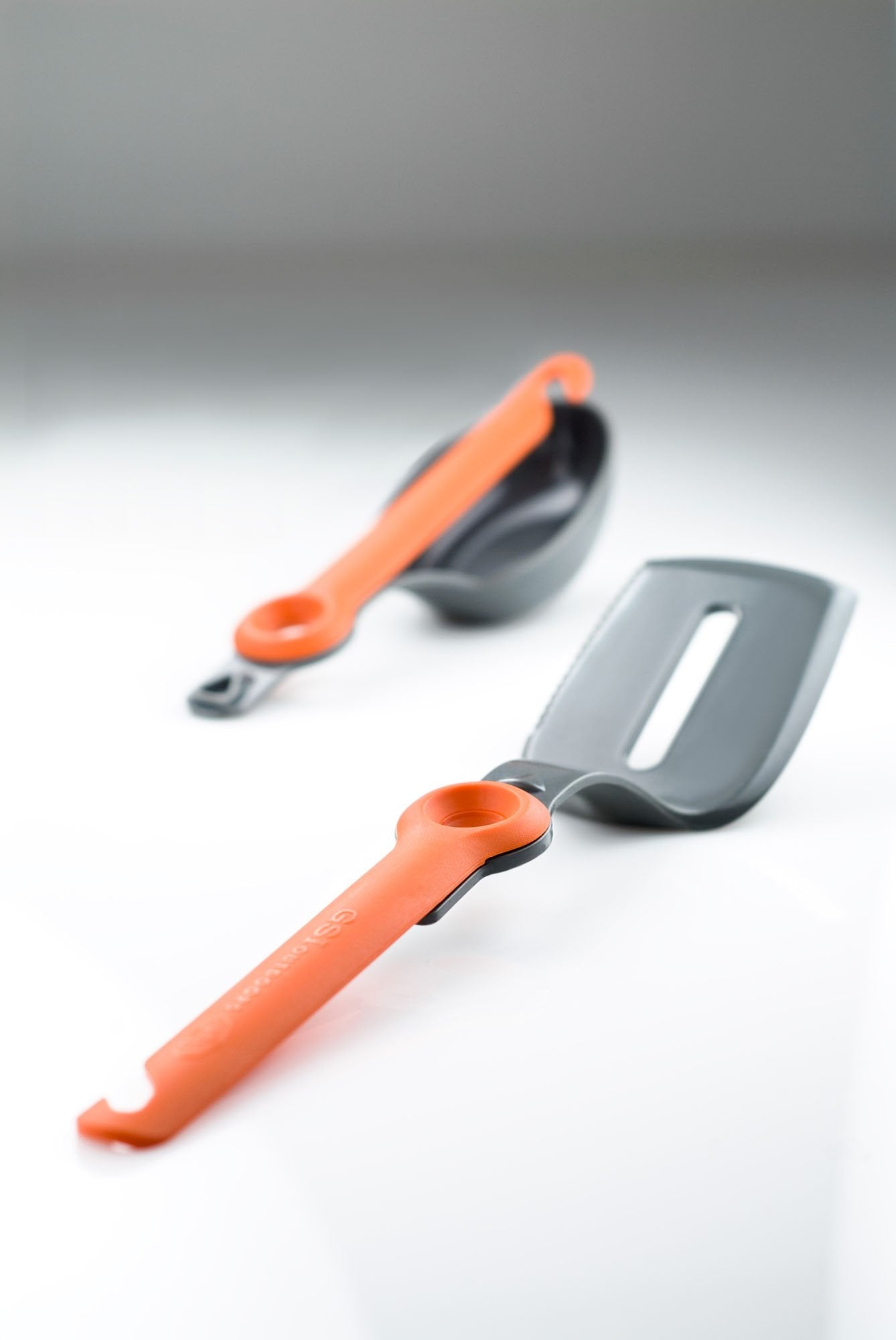 GSI Outdoors pivot spatula supports quick tool rotation for organized cooking.