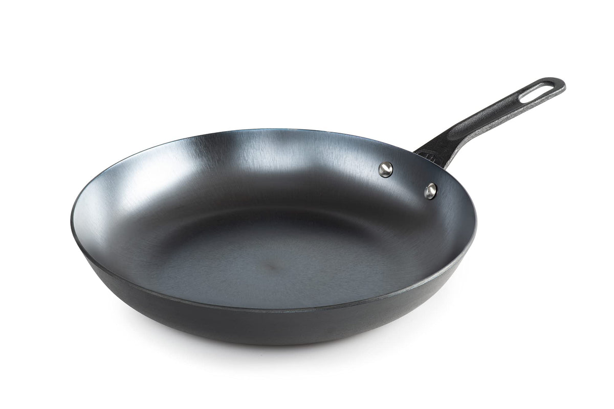 GSI Outdoors Guidecast 12-Inch Frying Pan on campfire for quick outdoor meals