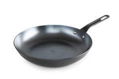 GSI Outdoors Guidecast 12-Inch Frying Pan on campfire for quick outdoor meals