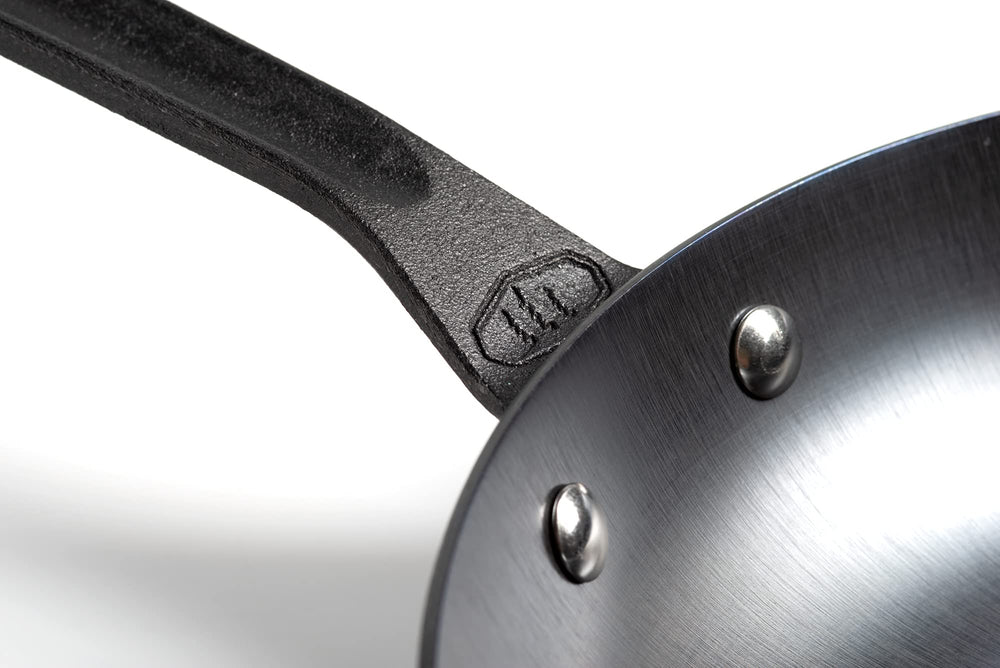GSI Outdoors Guidecast 12-Inch Frying Pan on stove top for home cooking